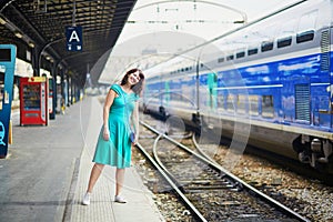 Young woman in Parisian underground or railway station