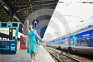 Young woman in Parisian underground or railway station