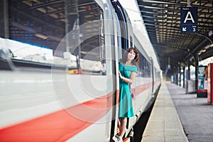 Young woman in Parisian underground or railway station