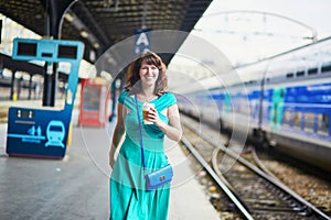 Young woman in Parisian underground or railway station