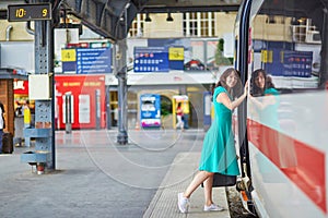 Young woman in Parisian underground or railway station