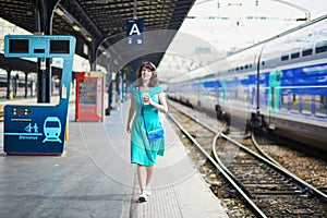 Young woman in Parisian underground or railway station