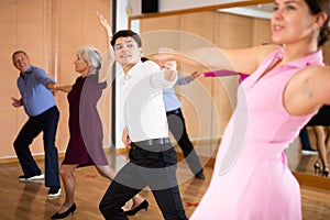 young woman with partner dance jive