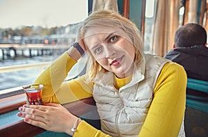 Young woman passenger of a sightseeing ship
