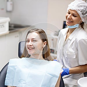 Young woman patient waiting treatment in stomatology clinic.