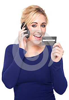 Young Woman Paying by Credit Card and Cell Phone