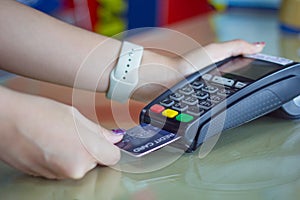 Young woman paying by credit card. Credit card payment, buy and sell products & service concept.