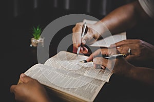 Young woman person hand holding holy bible with study at home. Adult female christian reading book in church. Girl learning