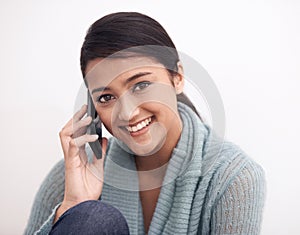 Young woman, phone call and communication in portrait with smile at home, conversation and happy for technology and