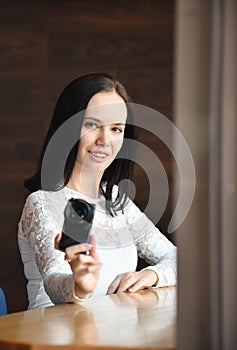 Young woman photographer with digital camera