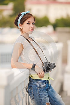 Young woman photographer portrait. Soft colors.