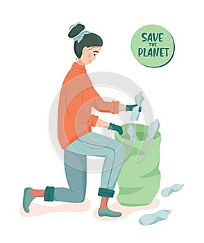 Young woman picks up plastic bottles in a garbage bag.  Ecology concept. Save the planet. Ecological lifestyle. Stop pollution.