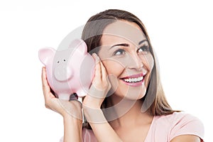 Young woman with piggy bank