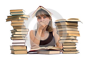 young woman and a pile of books
