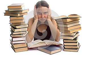 Young woman and a pile of books