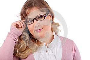 Young woman in pink blouse and glasses