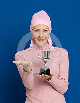 Young woman with pink scarf on the head