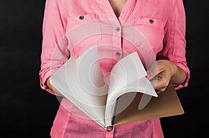 Young woman in pink shirt