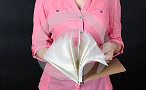 Young woman in pink shirt