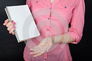 Young woman in pink shirt