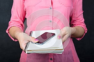 Young woman in pink shirt