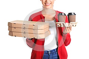 Young woman with pizza boxes and cups of coffee on white background. Food delivery service