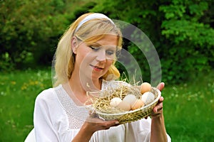 Young woman and plain eggs