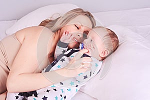 Young woman playing with baby boy