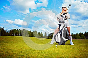 Young woman playing golf