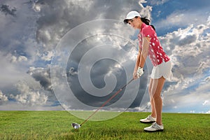 Young Woman Playing Golf