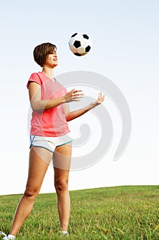 Young Woman Playing Soccer