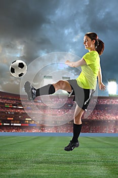 Young Woman Playing Soccer