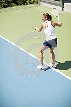 Young woman playing tennis