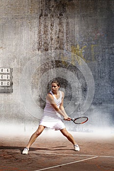 Young woman playing tennis