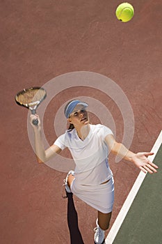 Young Woman Playing Tennis