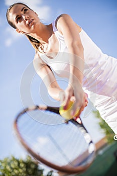 Young woman playing tennis