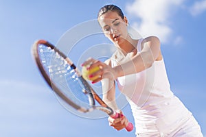 Young woman playing tennis