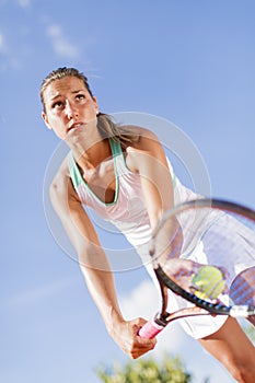 Young woman playing tennis