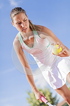 Young woman playing tennis