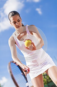 Young woman playing tennis