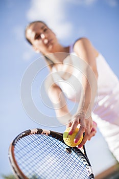 Young woman playing tennis