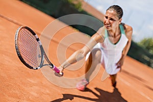 Young woman playing tennis