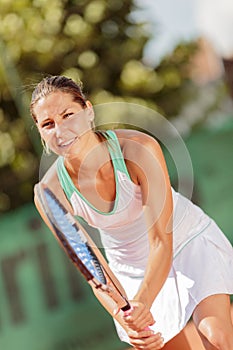 Young woman playing tennis