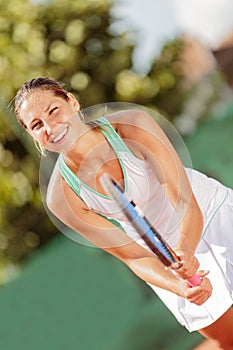 Young woman playing tennis