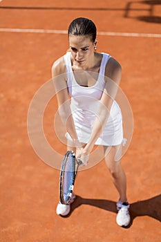 Young woman playing tennis