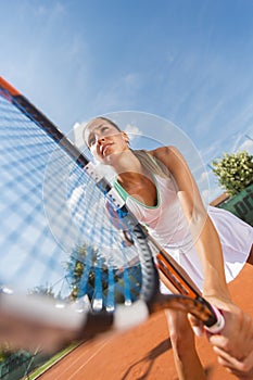 Young woman playing tennis