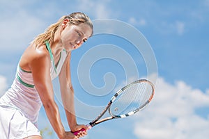 Young woman playing tennis