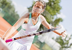 Young woman playing tennis