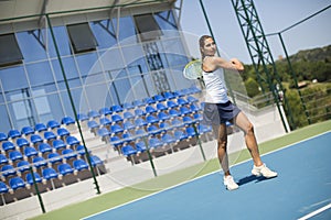 Young woman playing tennis