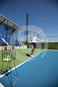 Young woman playing tennis